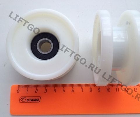 Ролик направляющий верхний поручня эскалатора OTIS